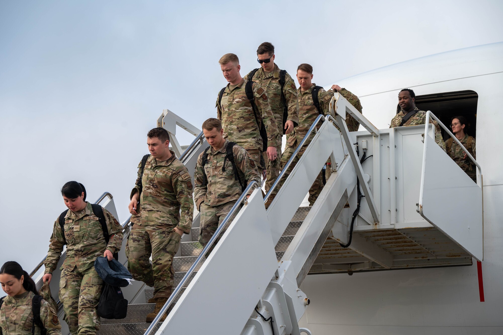 Airmen from Minot Air Base exit an Atlas Air Boeing 767 aircraft at RAF Fairford