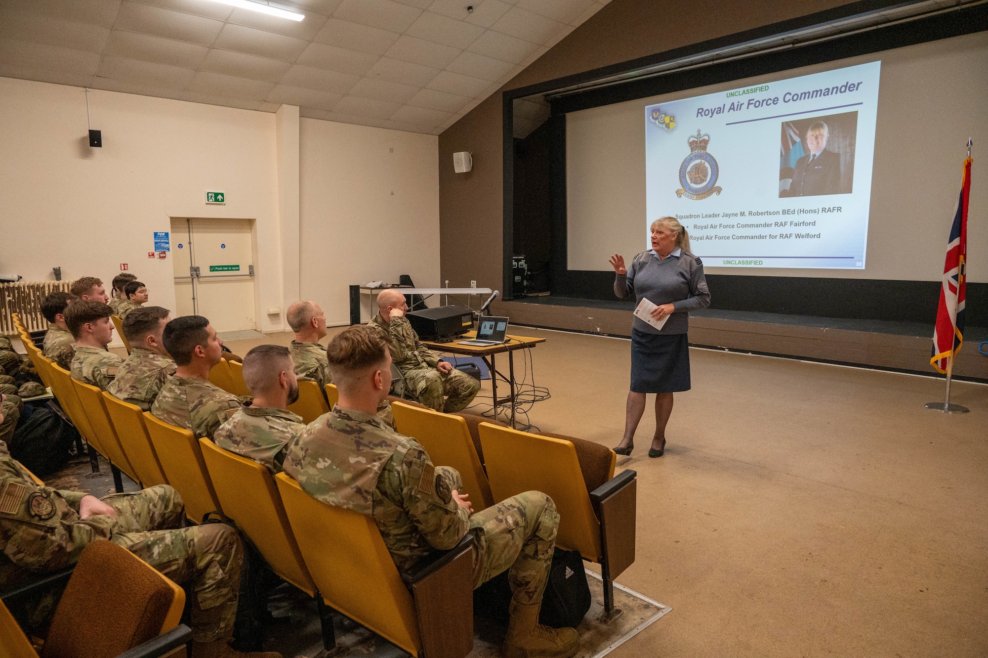 RAF commander for RAF Fairford speaks to deployed Airmen during an in-processing brief