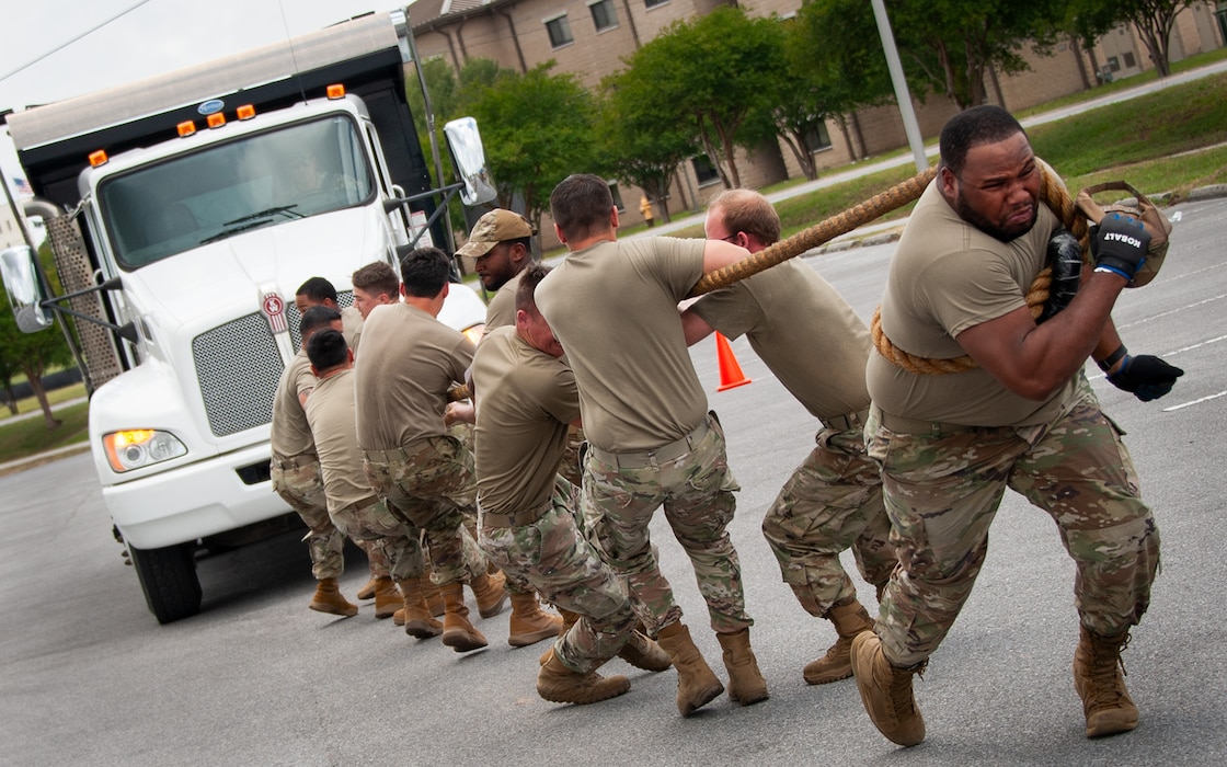 A team from the 96th Logistics Readiness Squadron pulls a 22,000 lbs. truck