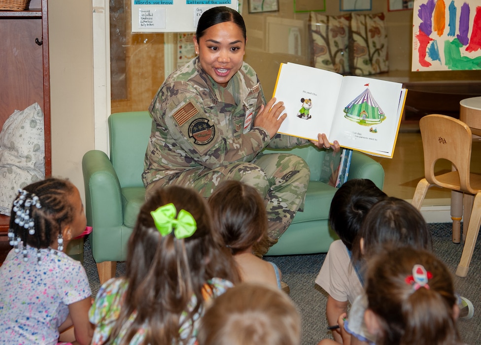 Tech. Sgt. Michelle Ford, 96th Force Support Squadron, reads to children
