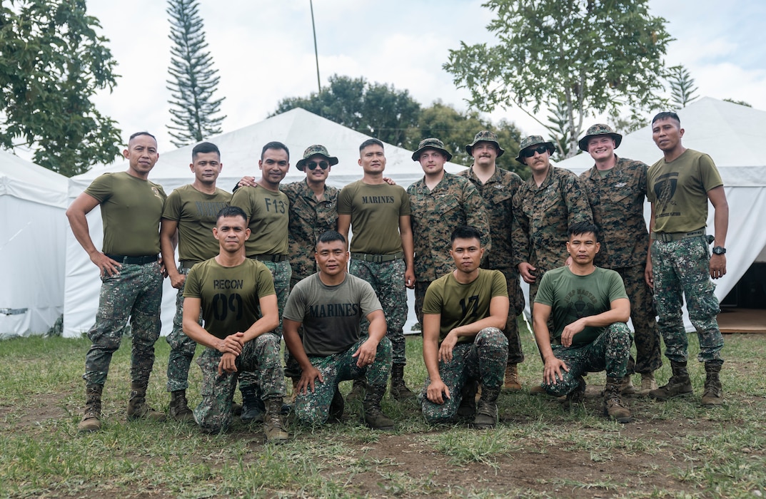 240514-M-DC769-1136 U.S. Navy Sailors with Shock Trauma Section, 1st Medical Battalion and Philippine marines with 1st Marine Brigade, pose for a photo after a Tactical Combat Casualty Care subject matter expert exchange during Archipelagic Coastal Defense Continuum  in Barira, Philippines, May 14, 2024. TCCC teaches non-medical personnel the medical skills necessary to ensure lifesaving treatment can be rendered in the absence of a corpsman and improve the survivability of those wounded or injured in combat. ACDC is a series of bilateral exchanges and training opportunities between U.S. Marines and Philippines marines aimed at bolstering the Philippine Marine Corps’ Coastal Defense strategy while supporting the modernization efforts of the Armed Forces of the Philippines. (U.S. Marine Corps photo by Sgt. Shaina Jupiter)