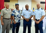 From right to left, Air Force Maj. Marvin Yamada Jr., a mission crew commander in the Western Air Defense Sector, Joint Base Lewis-McChord, Washington; Senior Enlisted Advisor Tony Whitehead, the senior enlisted advisor to the chief of the National Guard Bureau; Yamada's father and Command Sgt. Maj. Celso Leonen, command senior enlisted leader for the Guam National Guard, pose during a ceremony at the Ngarachamayong Cultural Center in downtown Koror, Palau, April 29, 2024. Palau President Surangel Whipps Jr., Guam Gov. Lou Leon Guerrero, and Army National Guard Col. Michael Cruz, adjutant general of the Guam National Guard, signed a declaration formalizing the nation's newest state partnership between the U.S. territory of Guam and the Republic of Palau.