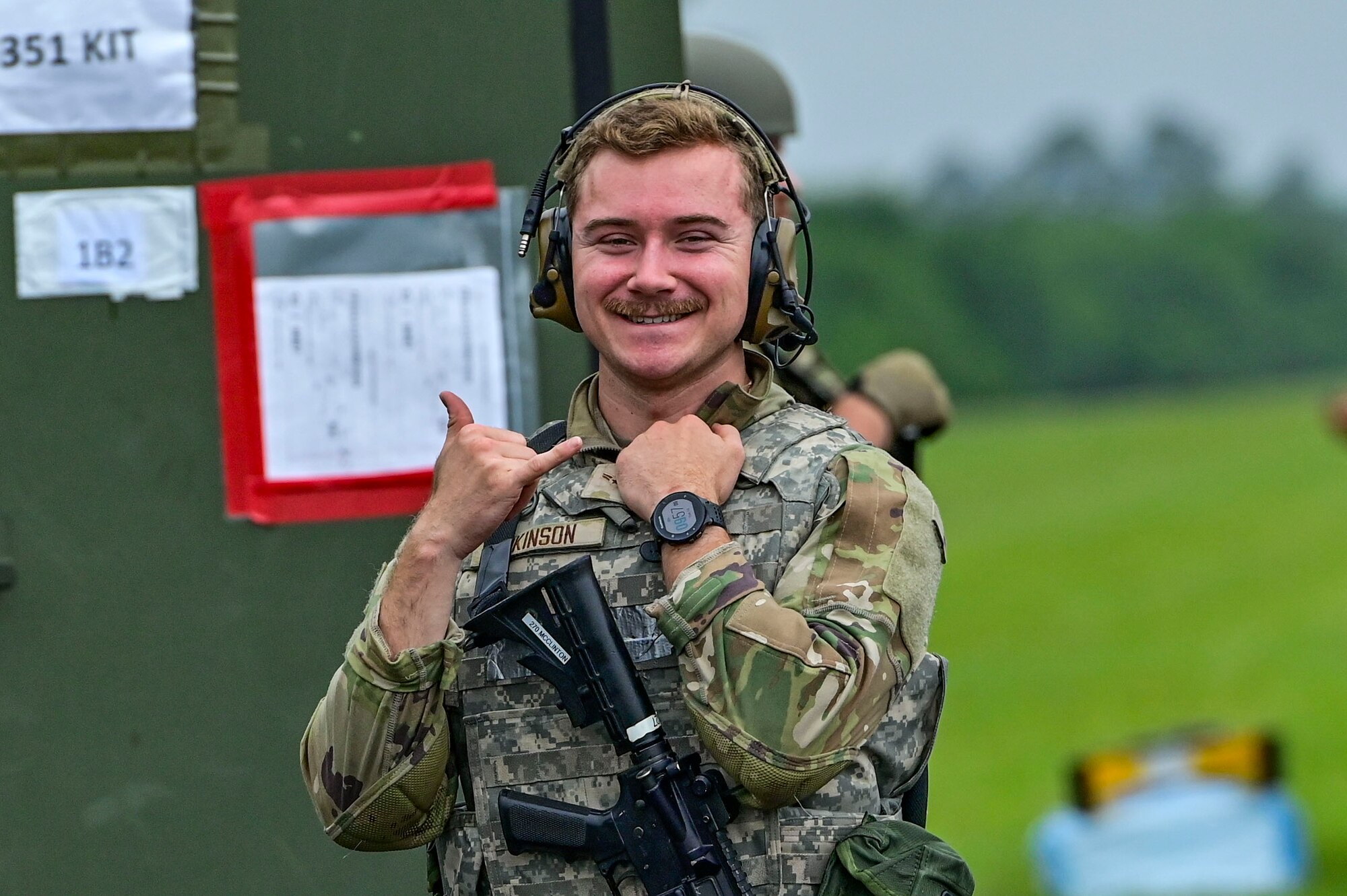 Airman smiling outside.