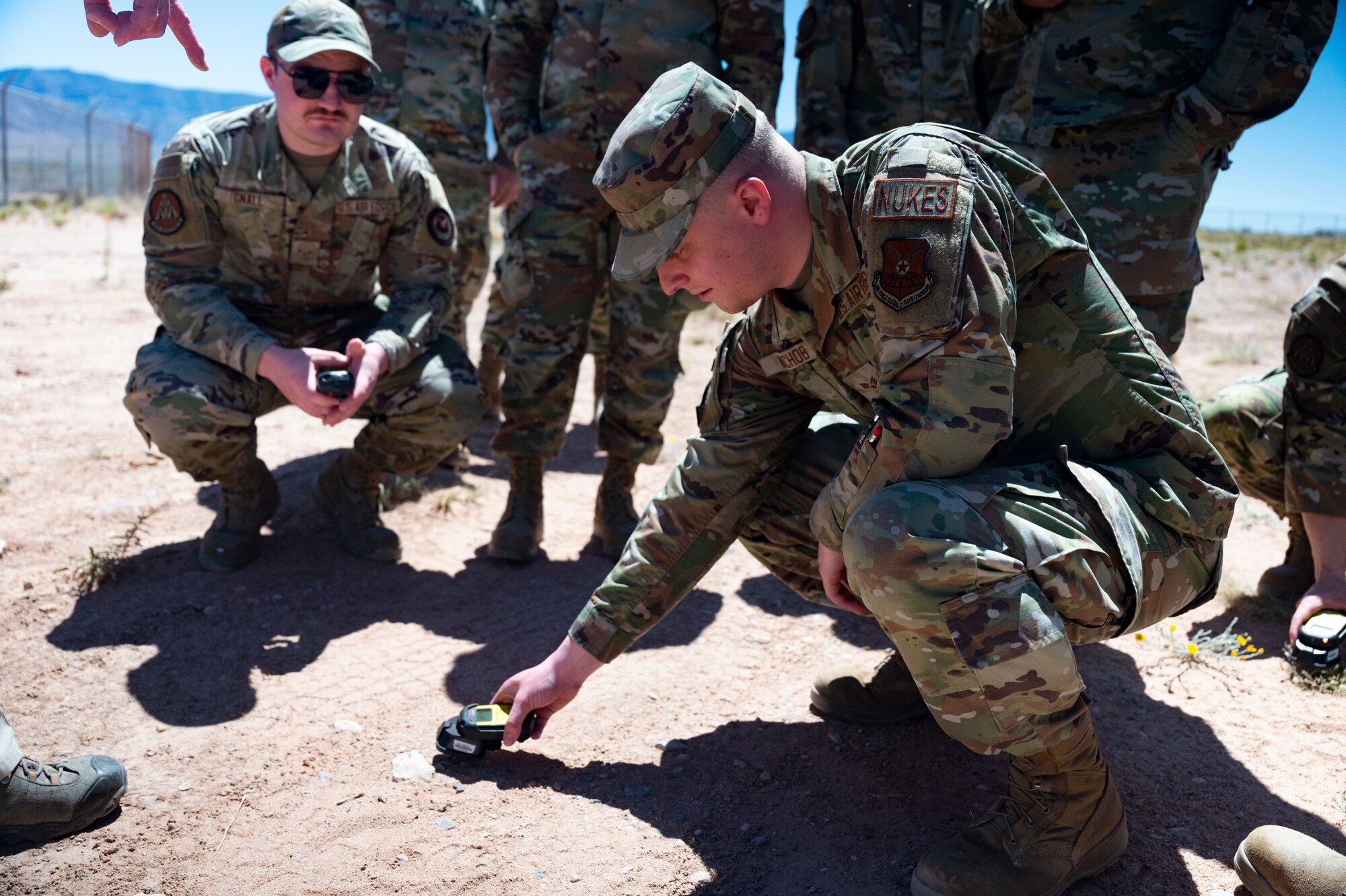 Man measures radiation with radiation equipment.