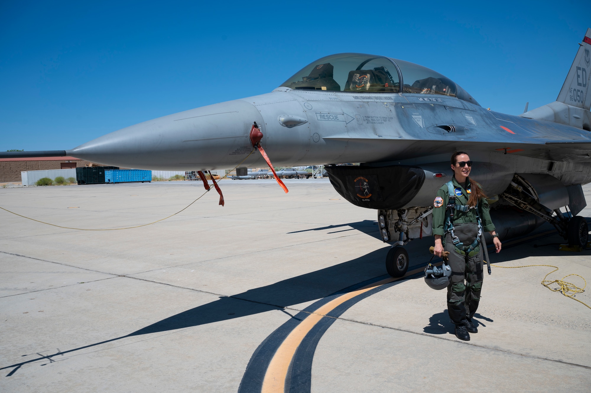 Capt. Fanny Chollet, Swiss Air Force Test Pilot Student, prepares for a flight for Air Force Test Pilot School located at Edwards Air Force Base. After graduating from Air Force Test Pilot School on June 8, 2024, she will be the first female test pilot. Capt. Chollet is also the first female fighter pilot for the Swiss Air Force.  (Air Force Photo by Mary Kozaitis)