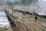 U.S. Army Soldiers from the 43rd Multi-Role Bridge Company, 20th Engineer Battalion, 36th Engineer Brigade conduct a Wet Gap Crossing on May 11, 2024, at the Drawsko Combat Training Center, Poland, in support of Immediate Response 24.