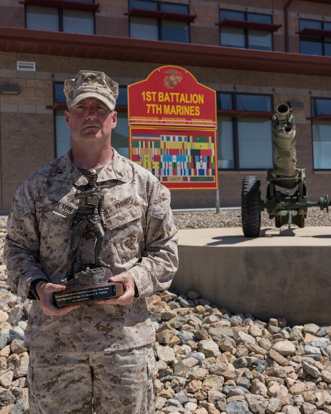 U.S. Marine Corps Chief Warrant Officer 3 Deacon Holton, the battalion gunner for 3rd Light Armored Reconnaissance Battalion, 1st Marine Division, poses for a photo at Marine Corps Air-Ground Combat Center Twentynine Palms, California, May 23, 2024. Holton was recently selected as the recipient of the 2023 Gunner Henry Lewis Hulbert Trophy for Outstanding Leadership for his work while serving with 1st Battalion, 7th Marine Regiment, 1st MARDIV. Holton is a native of Chelsea, Michigan. (U.S. Marine Corps photo by Sgt. Alexandra Munoz)