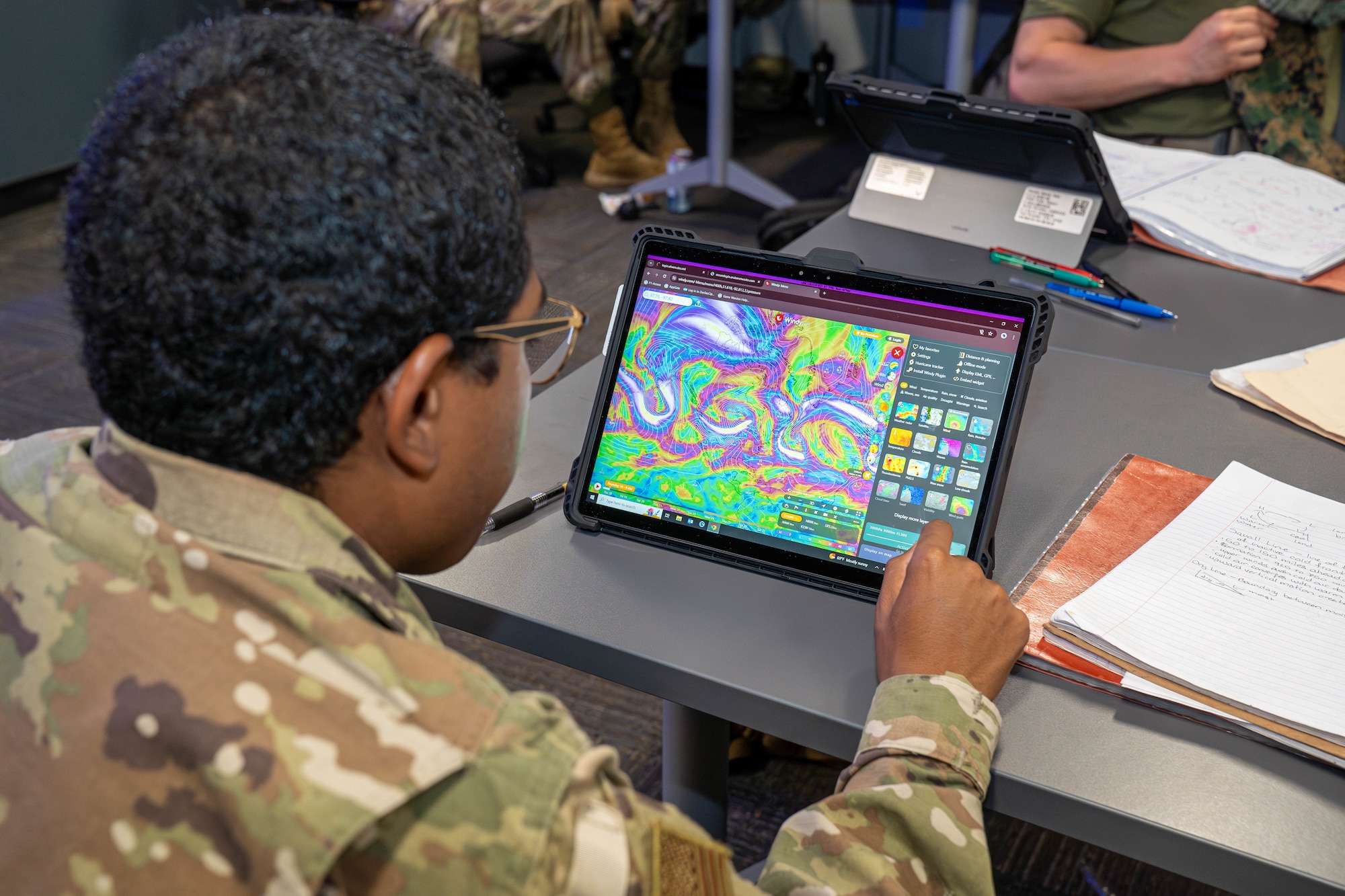 335th Training Squadron students participate in group discussions in class at the Weather Training Complex on Keesler Air Force Base, Mississippi, April 18, 2024.