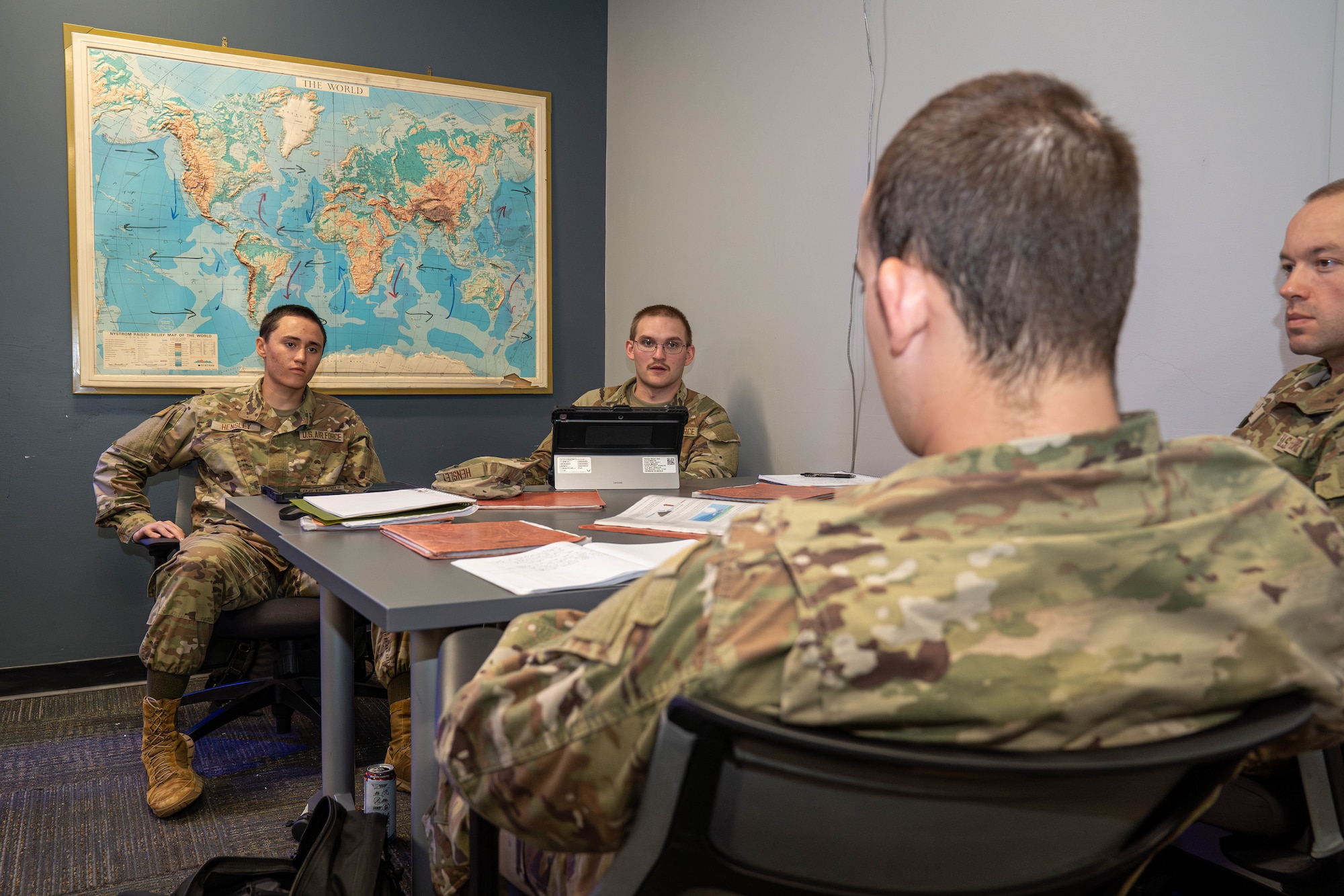 U.S. Airmen converse about upcoming subjects they'll study in the future at the Weather Training Complex on Keesler Air Force Base, Mississippi, April 18, 2024.