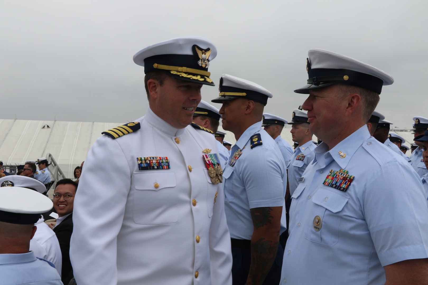 Capt. Rula Deisher and Capt. James O’Mara (pictured) conduct a personnel inspection during the U.S. Coast Guard Cutter Munro’s (WMSL 755) change of command ceremony in San Diego on May 30, 2024. Vice Adm. Andrew J. Tiongson, Commander, U.S. Coast Guard Pacific Area, presided over the ceremony in which O’Mara relieved Deisher as Munro’s commanding officer. U.S. Coast Guard photo by Ensign Samika Lewis.