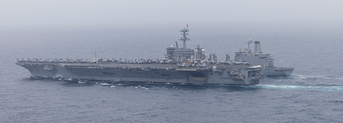 240530-N-VA915-1235 PACIFIC OCEAN (May 30, 2024) Nimitz-class aircraft carrier USS Abraham Lincoln (CVN 72) conducts a replenishment-at-sea with the Henry J. Kaiser-class fleet replenishment oiler USNS Pecos (T-AO 197). Abraham Lincoln, flagship of Carrier Strike Group Three, is underway conducting integrated exercises to bolster strike group readiness and capability in the U.S. 3rd Fleet area of operations. (U.S. Navy photo by Mass Communication Specialist 1st Class Jerome D. Johnson)
