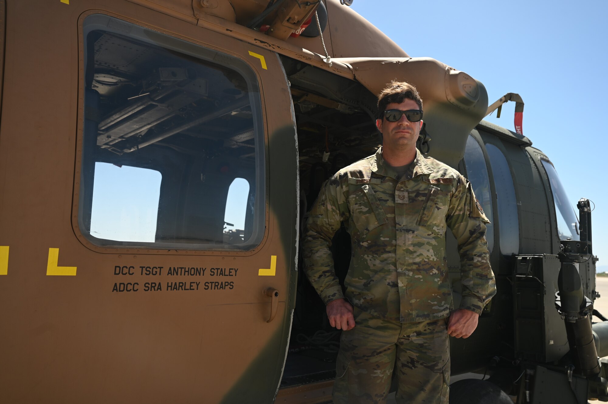U.S. Air Force Tech Sgt. Anthony Staley, 943rd Maintenance Squadron crew chief, opens an HH-60G door at Davis-Monthan Air Force Base, Ariz., May 6, 2024. The quality assurance review took place weeks before the official retirement of the aircraft, emphasizing the squadron’s commitment to mission operations and standards. (U.S. Air Force photo by Senior Airman Andrew Garavito)