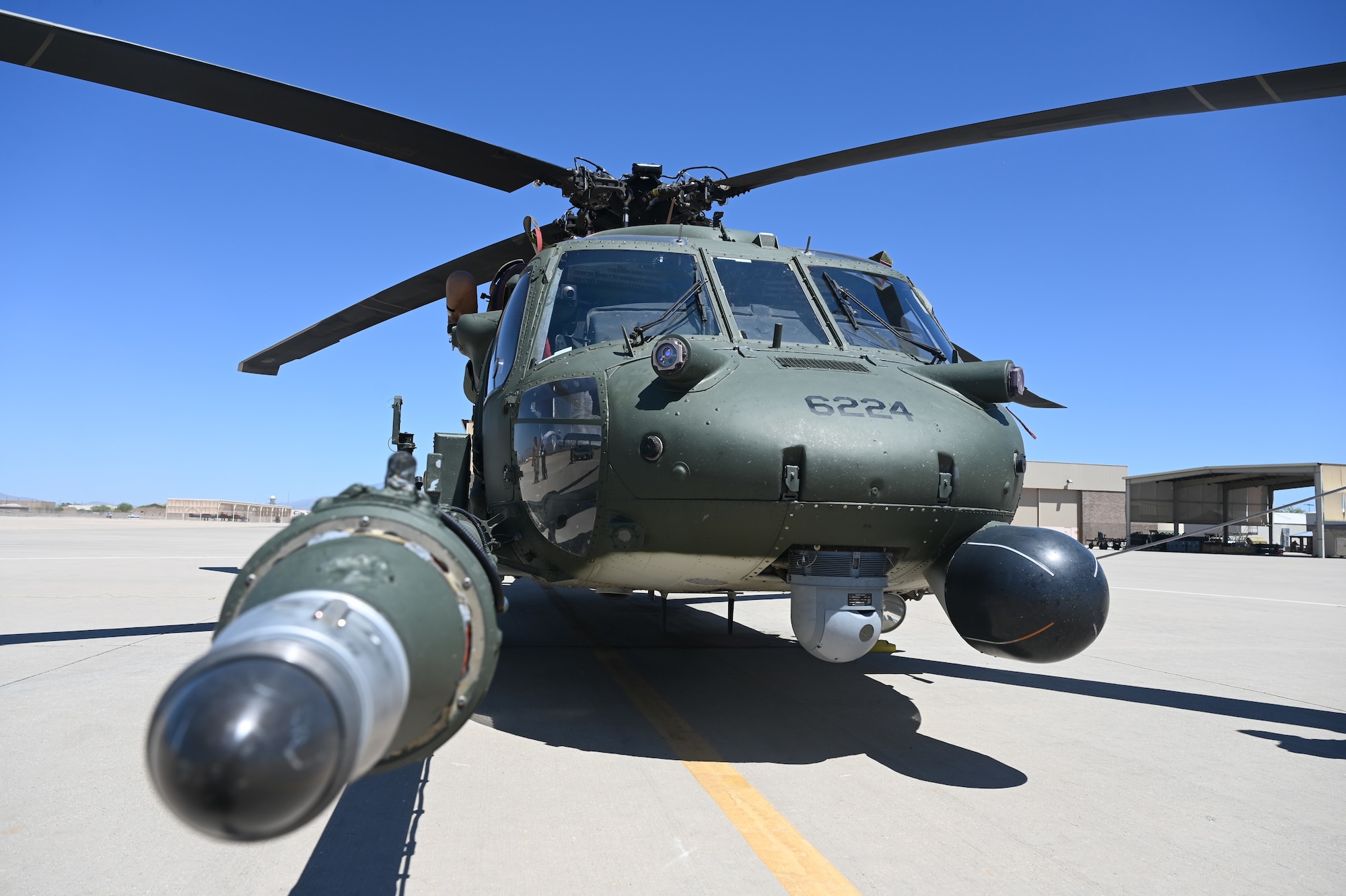 An HH-60G Pave Hawk helicopter assigned to the 943rd Rescue Squadron sits on the flightline at Davis-Monthan Air Force Base, Ariz., May 6, 2024. The primary mission of the HH-60G was to conduct day or night personnel recovery operations into hostile environments to recover isolated personnel during war. (U.S. Air Force photo by Senior Airman Andrew Garavito)