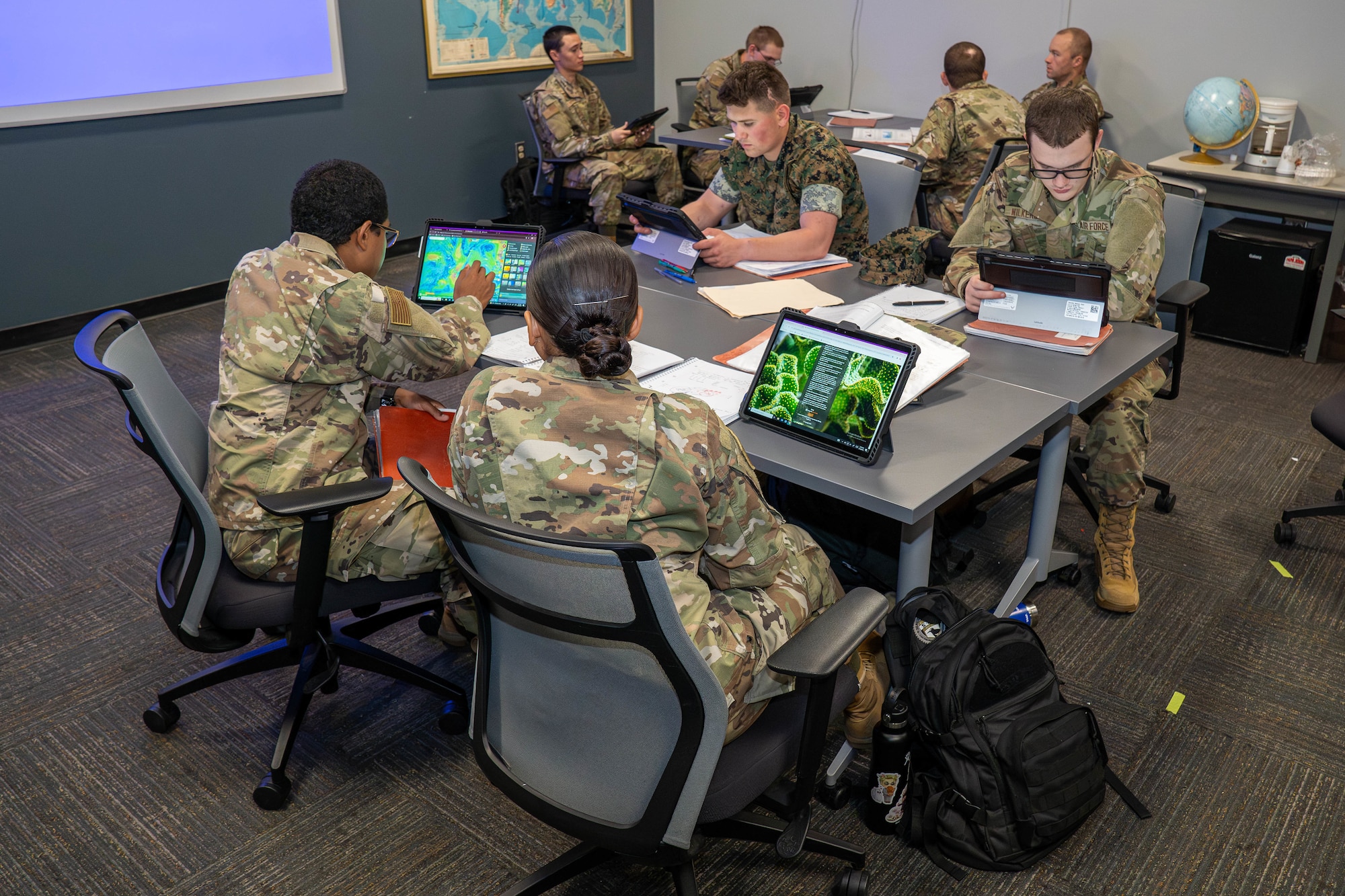 A group of students study together using the Learn-to-Win platform at the Weather Training Complex on Keesler Air Force Base, Mississippi, April 18, 2024.