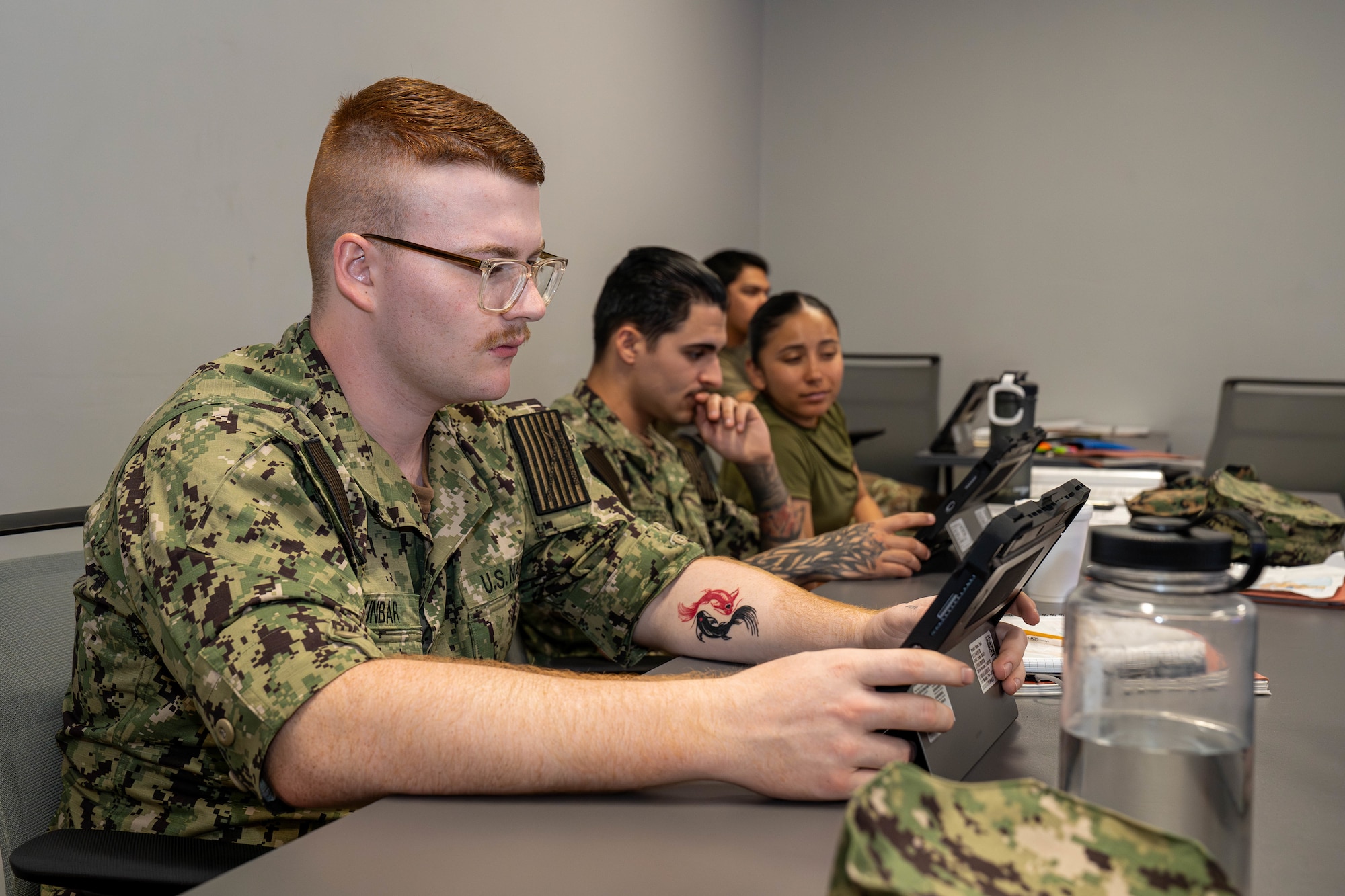 U.S. Navy Seaman Harvey Dunbar, 335th Training Squadron weather student, loads content on his tablet during the Weather Apprentice course at the Weather Training Complex on Keesler Air Force Base, Mississippi, April 18, 2024.