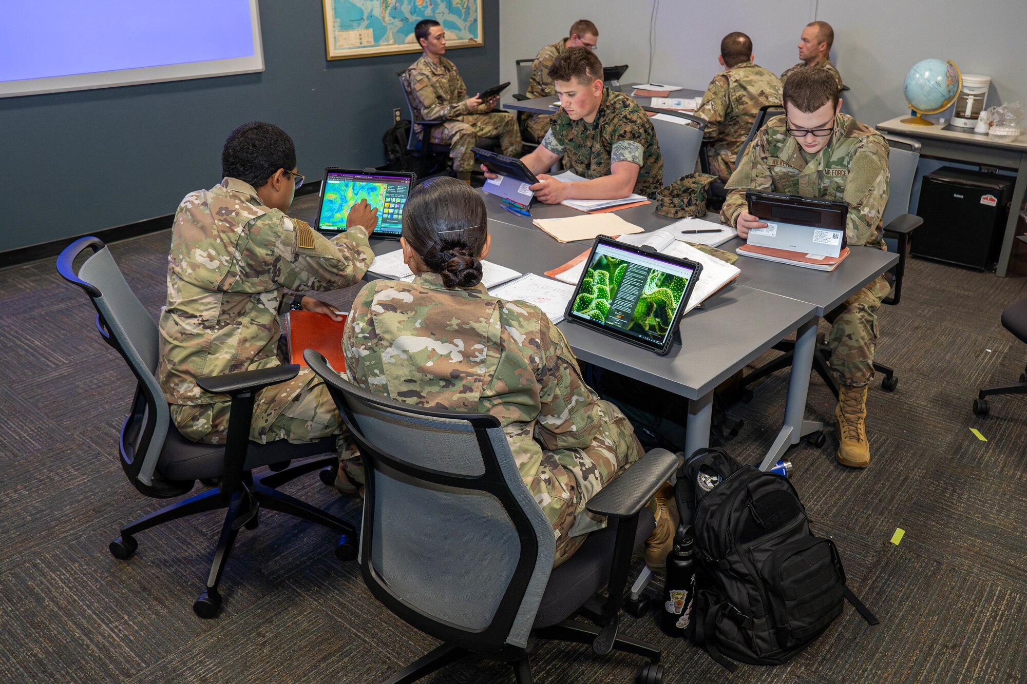 A group of students study together using the Learn-to-Win platform at the Weather Training Complex on Keesler Air Force Base, Mississippi, April 18, 2024.