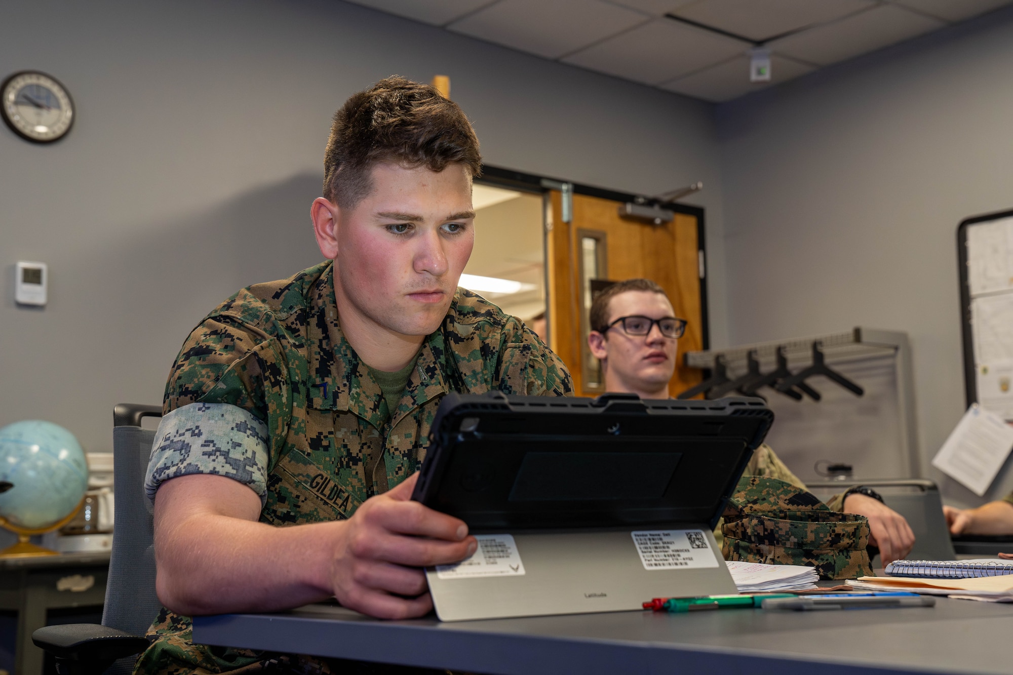 U.S. Marine Corps Private First Class George Gildea, 335th Training Squadron weather student, uses his tablet for classwork at the Weather Training Complex on Keesler Air Force Base, Mississippi, April 18, 2024.