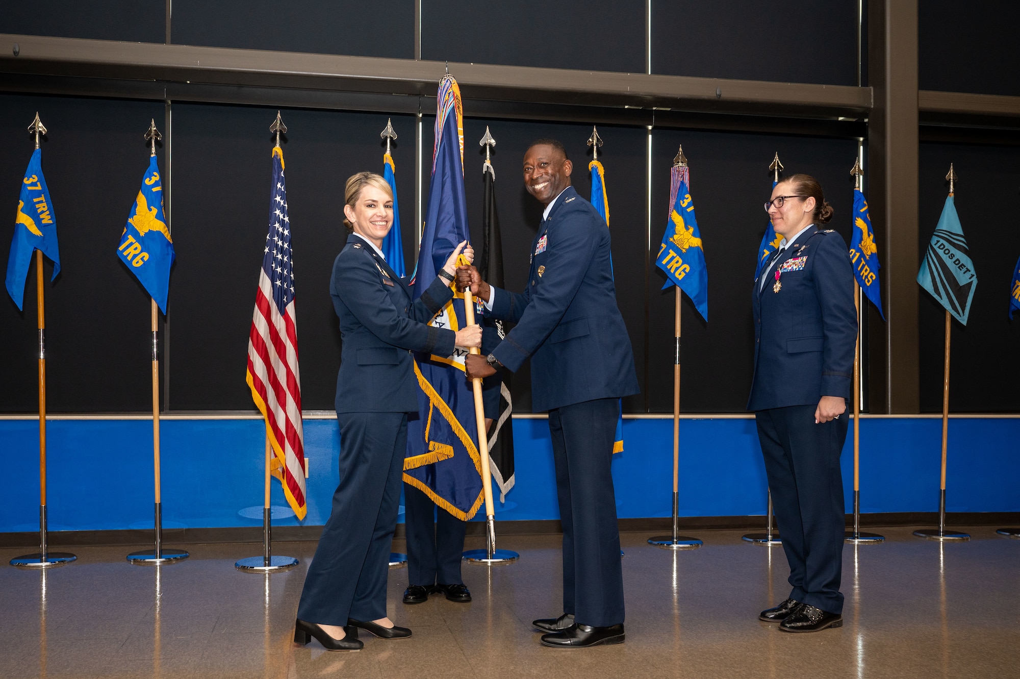 Col. Willie Cooper III assumes command of the 37th Training Wing from Maj. Gen. Michele Edmondson, 2nd Air Force commander, May 30 at Joint Base San Antonio-Lackland, Texas. Cooper was the former 375th Mission Support Group commander at Scott Air Force Base, Ill., and succeeded Col. Lauren Courchaine who will transition to a new role as the Senior Military Assistant to the Under Secretary of the Air Force at the Pentagon. (U.S. Air Force photo by Ava Leone)
