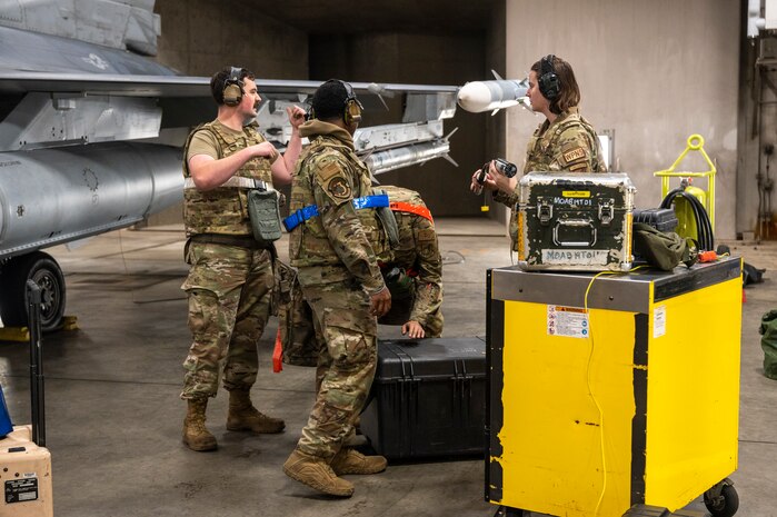 U.S. Air Force Airmen assigned to the 35th Maintenance Group brief one another during the Beverly Sunrise 24-6 exercise at Misawa Air Base, Japan, Oct. 24, 2024.
