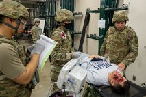 U.S. Air Force medical personnel assigned to the 35th Medical Group chart injuries of a casualty actor during the Beverly Sunrise 24-6 exercise at Misawa Air Base, Japan, Oct. 24, 2024.