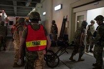 U.S. Air Force Airmen with the 35th Medical Group simulate emergency medical response procedures at the Urgent Care Services tunnel during the Beverly Sunrise 24-6 exercise at Misawa Air Base, Japan, Oct. 24, 2024.