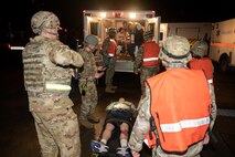 U.S. Air Force and U.S. Navy Medics from the 35th Medical Group simulate medical care procedures to casualty actors during the Beverly Sunrise 24-6 exercise at Misawa Air Base, Japan, Oct. 24, 2024.