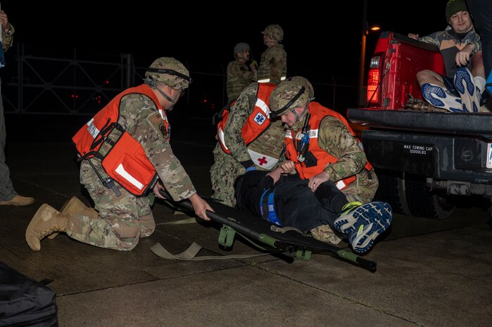 U.S. Air Force and U.S. Navy Medics from the 35th Medical Group simulate medical care procedures to casualty actors during the Beverly Sunrise 24-6 exercise at Misawa Air Base, Japan, Oct. 24, 2024.