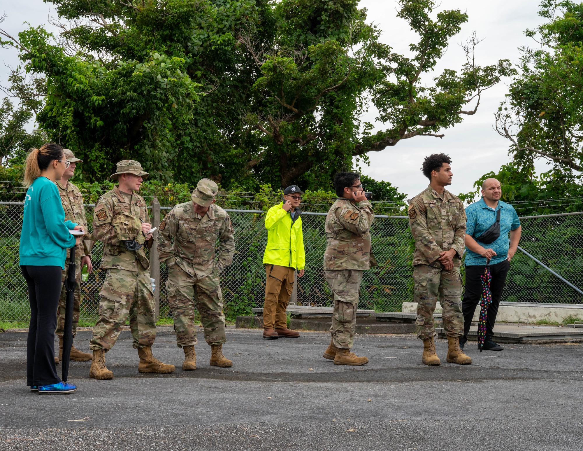 Airmen and contractors conduct a spill response training.