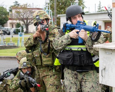Base defense personnel conduct training on military installation