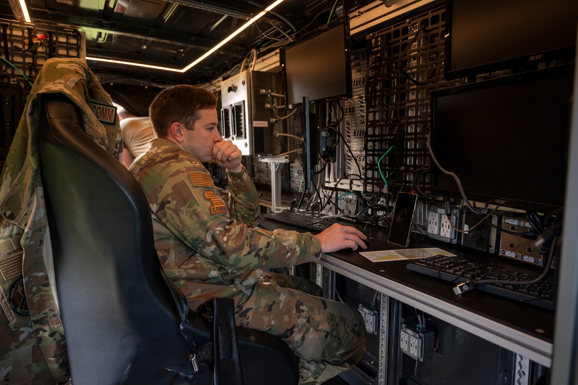 U.S. Air Force Senior Airman Lance Smith, 1st Combat Communications Squadron tactical communications technician, establishes a GPS connection on the Mobile Digital Infrastructure (MDI) vehicle at Hohenfels Joint Multinational Readiness Center, Germany, Oct. 28, 2024.