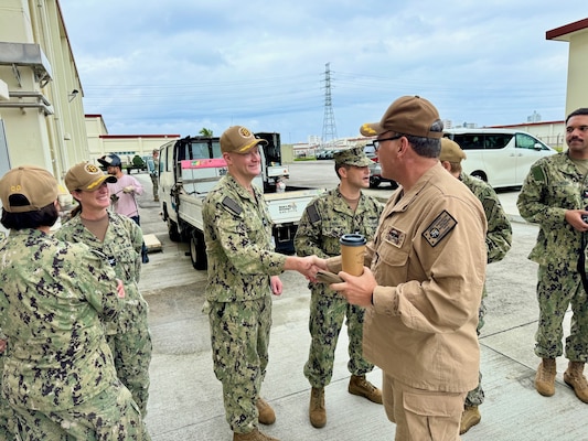 The EMF Bravo Triad is made up of the Commanding Officer, Capt. Ian Fowler, Executive Officer Capt. Shannan Rotruck, and Command Master Chief Shannon Bia.