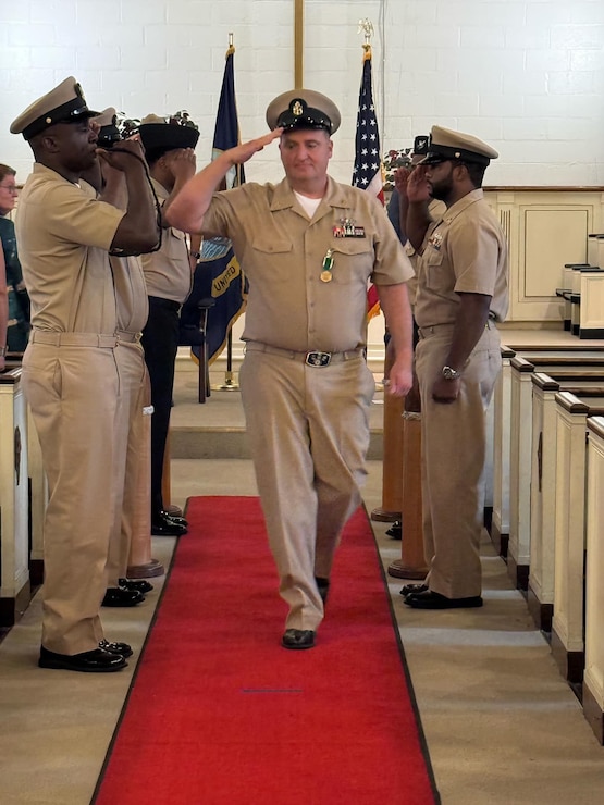 Chief Petty Officer Steve Mafort going ashore for the last time.