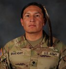 Native American Spc. Moses Brave Heart of the South Dakota Army National Guard’s 235th Military Police Company is growing his hair long after receiving an exception to military policy.