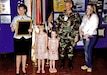 In one of her favorite pictures, Lydia Combs celebrates her promotion to lieutenant colonel with her three daughters by her side. Combs continued to serve, reaching the rank of colonel before retiring in 2014, culminating three decades of active-duty service.