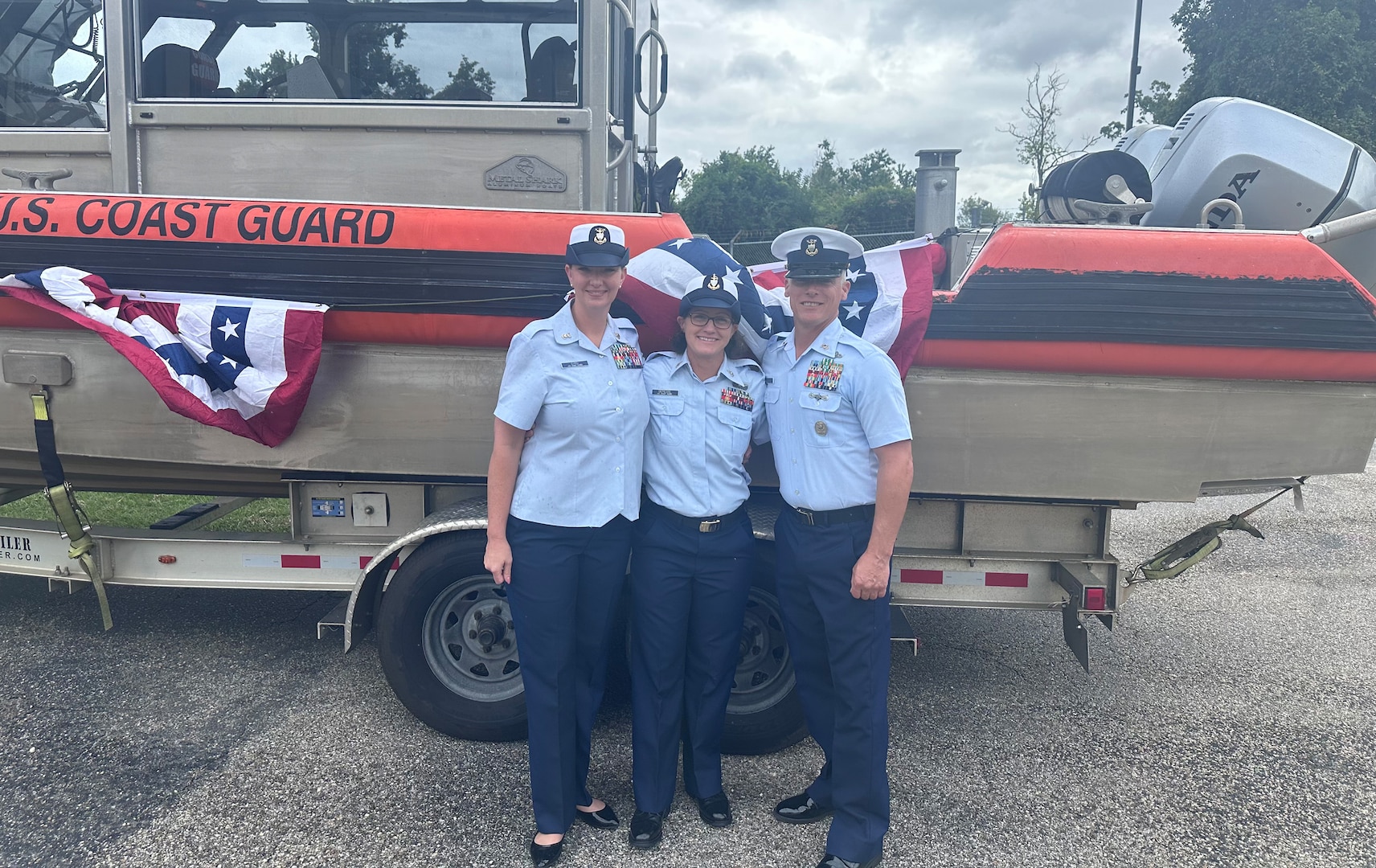 Master Chief Petty Officer Melanie Byrd, Senior Chief Petty Officer Shannon Depiesse, and Master Chief Petty Officer of the Coast Guard Reserve Will Adams at Depiesse's retirement ceremony at Coast Guard Station Georgetown, South Carolina (U.S. Coast Guard photo courtesy of Cmdr. Sarah Ernst).