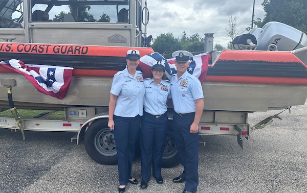 Master Chief Petty Officer Melanie Byrd, Senior Chief Petty Officer Shannon Depiesse, and Master Chief Petty Officer of the Coast Guard Reserve Will Adams at Depiesse's retirement ceremony at Coast Guard Station Georgetown, South Carolina (U.S. Coast Guard photo courtesy of Cmdr. Sarah Ernst).