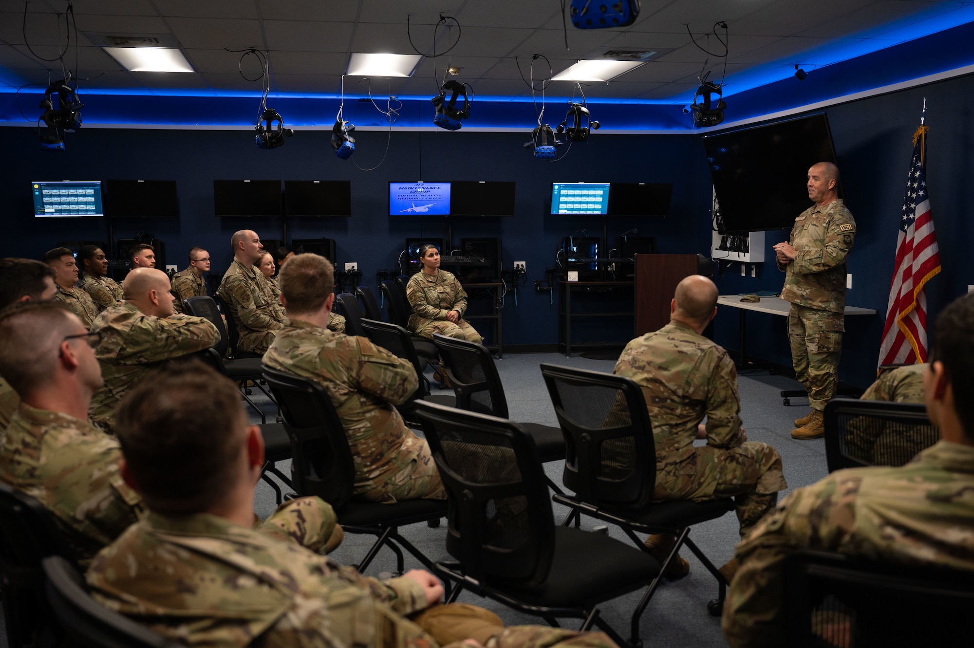 U.S. Air Force Chief Master Sgt. Trapper Otto, command first sergeant for Air Mobility Command, speaks to 317th Airlift Wing noncommissioned officers at Dyess Air Force Base, Texas, Oct. 30, 2024. NCOs are essential for bridging command and enlisted Airmen to execute missions while upholding high standards of performance and integrity. (U.S. Air Force photo by Airman 1st Class Emma Anderson)