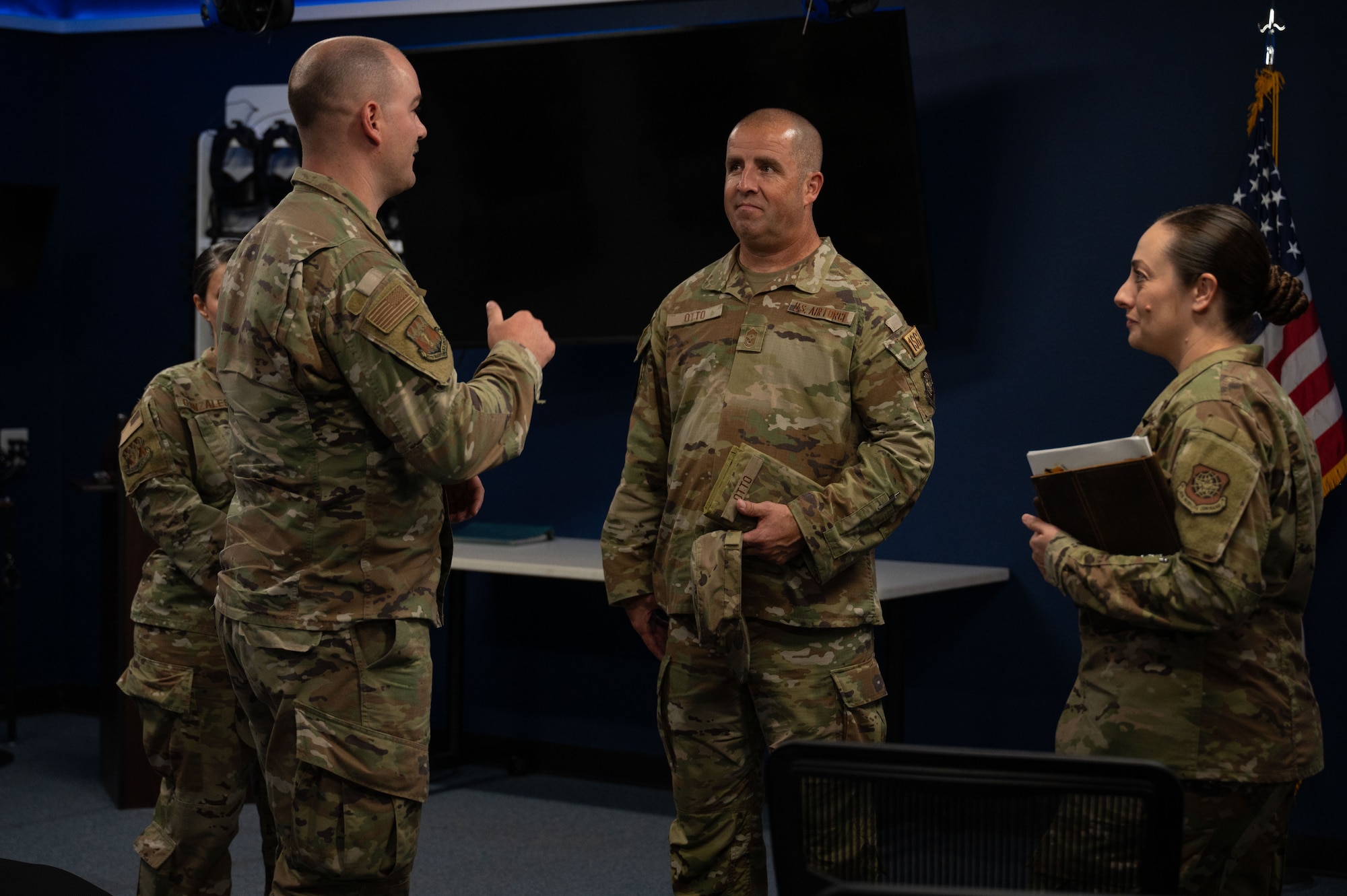 U.S. Air Force Chief Master Sgt. Trapper Otto, command first sergeant for Air Mobility Command, speaks to 317th Airlift Wing noncommissioned officers at Dyess Air Force Base, Texas, Oct. 30, 2024. NCOs are essential for bridging command and enlisted Airmen to execute missions while upholding high standards of performance and integrity. (U.S. Air Force photo by Airman 1st Class Emma Anderson)