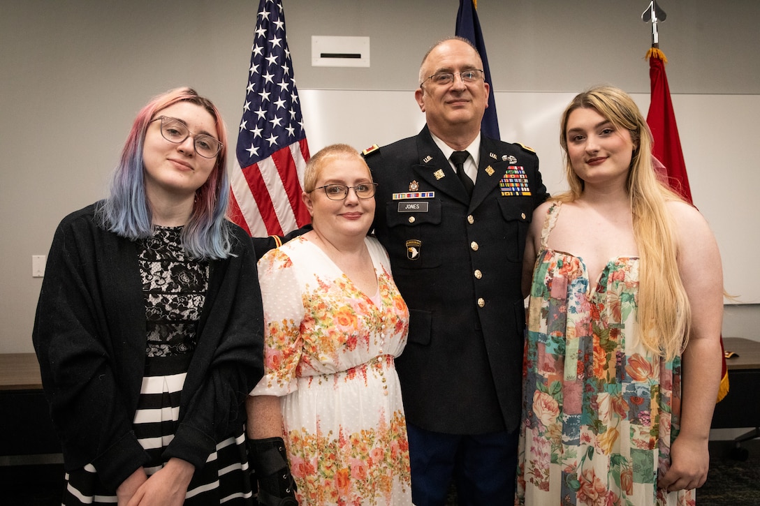 Col. Kevin Jones with wife, Tracie (center), and daughters, Sandra (left) and Samantha (right).