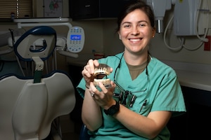 U.S. Air Force Capt. Grace “Ann” Danello, 375th Operational Medical Readiness Squadron general dentist at Scott Air Force Base, Illinois, wanted to help people by working in an area of healthcare, finally deciding on dentistry. Danello uses her career as a dentist as a challenge for her to solve and fix problems, but for her patients. (U.S. Air Force photo by Senior Airman Stephanie Henry)
