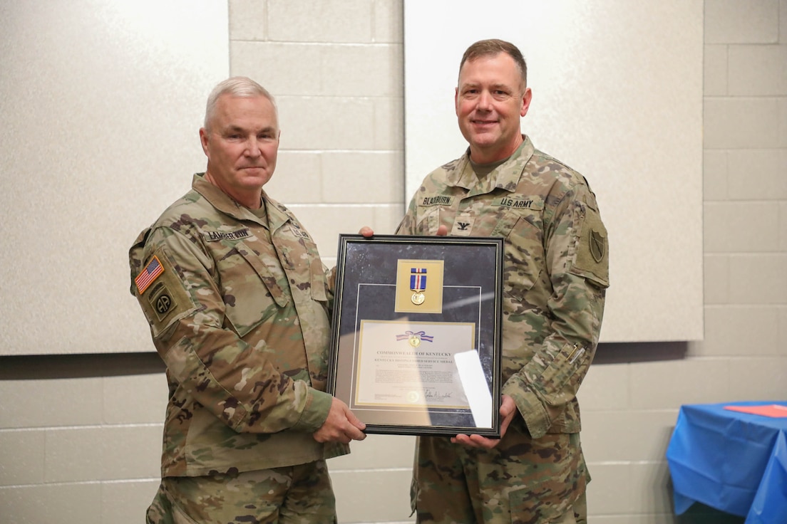 Col. John Blackburn is awarded the Kentucky Distinguished Service Medal during his retirement ceremony