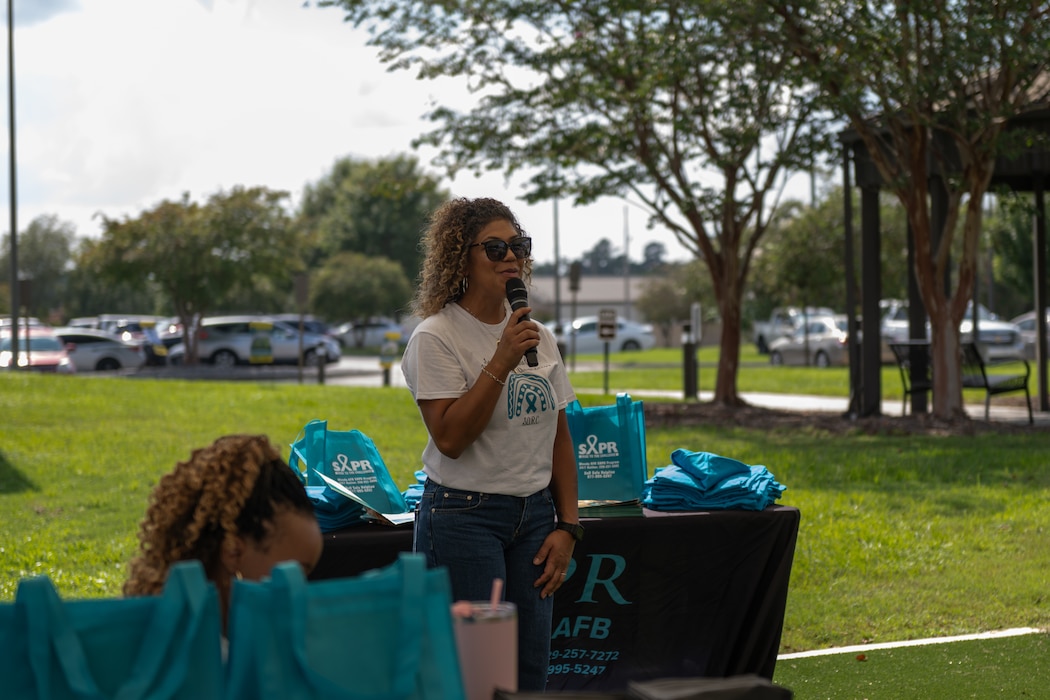 Luzmeilyn Camper, 23rd Wing sexual assault response coordinator, gives opening remarks at the grand opening of the new Sexual Assault Prevention and Response office at Moody Air Force Base, Georgia, Sept. 19, 2024. The grand opening served as a platform to express their gratitude for the support from the community. (U.S. Air Force photo by Airman 1st Class Savannah Carpenter)