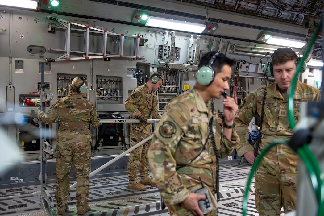 Airmen set up a C-17 to receive medical patients