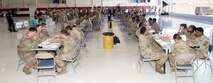 Maintenance Airmen from multiple units, enjoy free barbecue at Nellis Air Force Base, Nevada, Oct. 28, 2024.