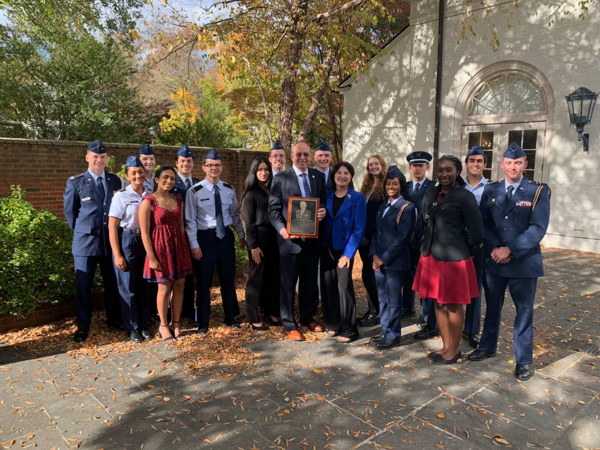 Retired Lt. Gen. David Deptula poses with cadets from Air Force Reserve Officers’ Training Corps, Detachment 890.