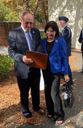 Retired Lt. Gen. David Deptula and spouse, Dianna, share a moment after the Holm Center alumni award induction ceremony