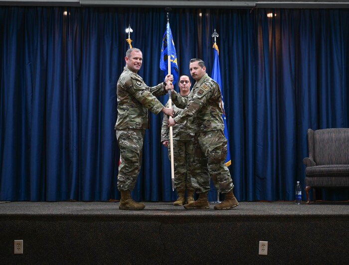 12th Air Task Force commander passes the guidon to U.S. Air Force Lt. Col.