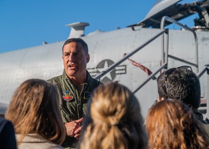 Maryland Air National Guard Brig. Gen. Drew E. Dougherty, assistant adjutant general-air of the Maryland National Guard, speaks with members of the U.S. State Department’s International Visitor Leadership Program during a visit at Martin State Air National Guard Base, Md., Oct. 25, 2024.