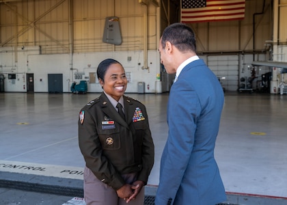 Maryland Army National Guard Maj. Gen. Janeen L. Birckhead, 31st adjutant general of the Maryland National Guard, speaks with a member of the State Department’s International Visitor Leadership Program during a visit at Martin State Air National Guard Base, Md., Oct. 25, 2024.