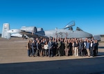 Members of the U.S. State Department’s International Visitor Leadership Program pose for a photo with Maryland Army National Guard Maj. Gen. Janeen L. Birckhead, 31st adjutant general of the Maryland National Guard and an A-10 aircraft.